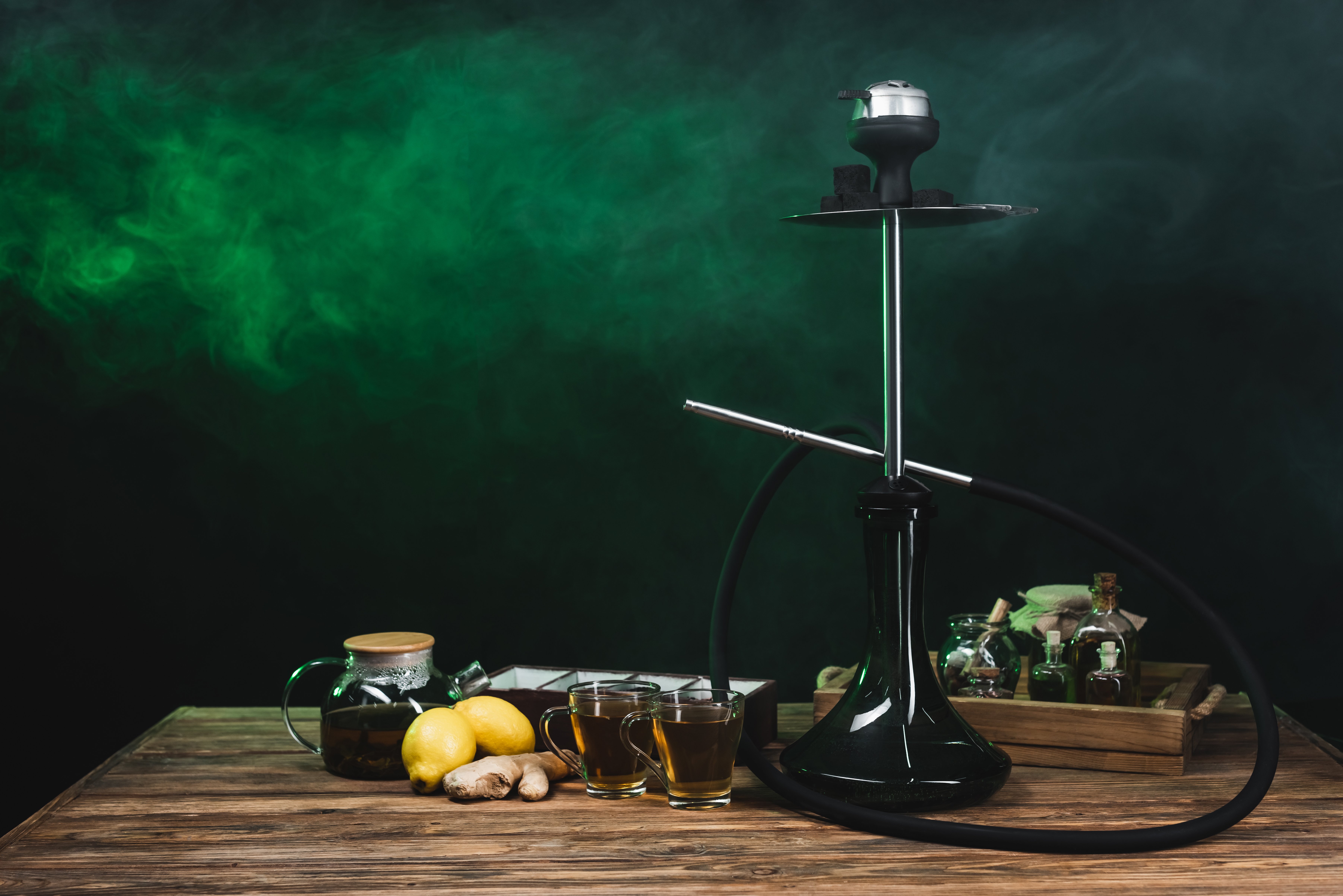 lemons-tea-and-hookah-on-wooden-surface-on-black-2024-11-14-13-49-26-utc lemons-tea-and-hookah-on-wooden-surface-on-black-2024-11-14-13-49-26-utc
